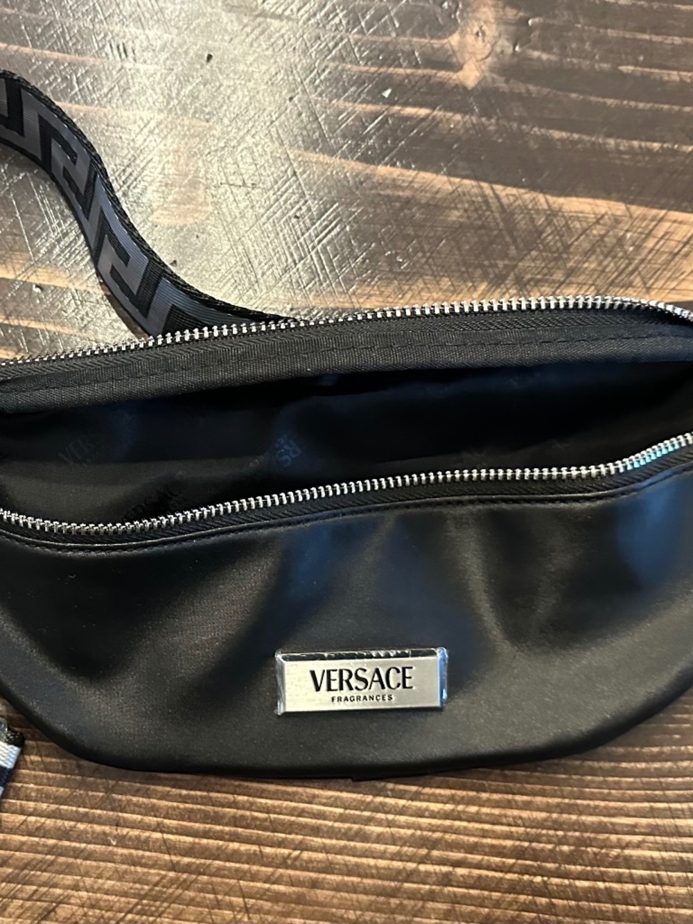Versace Fragrances Black Belt Bag with Greek Key Strap